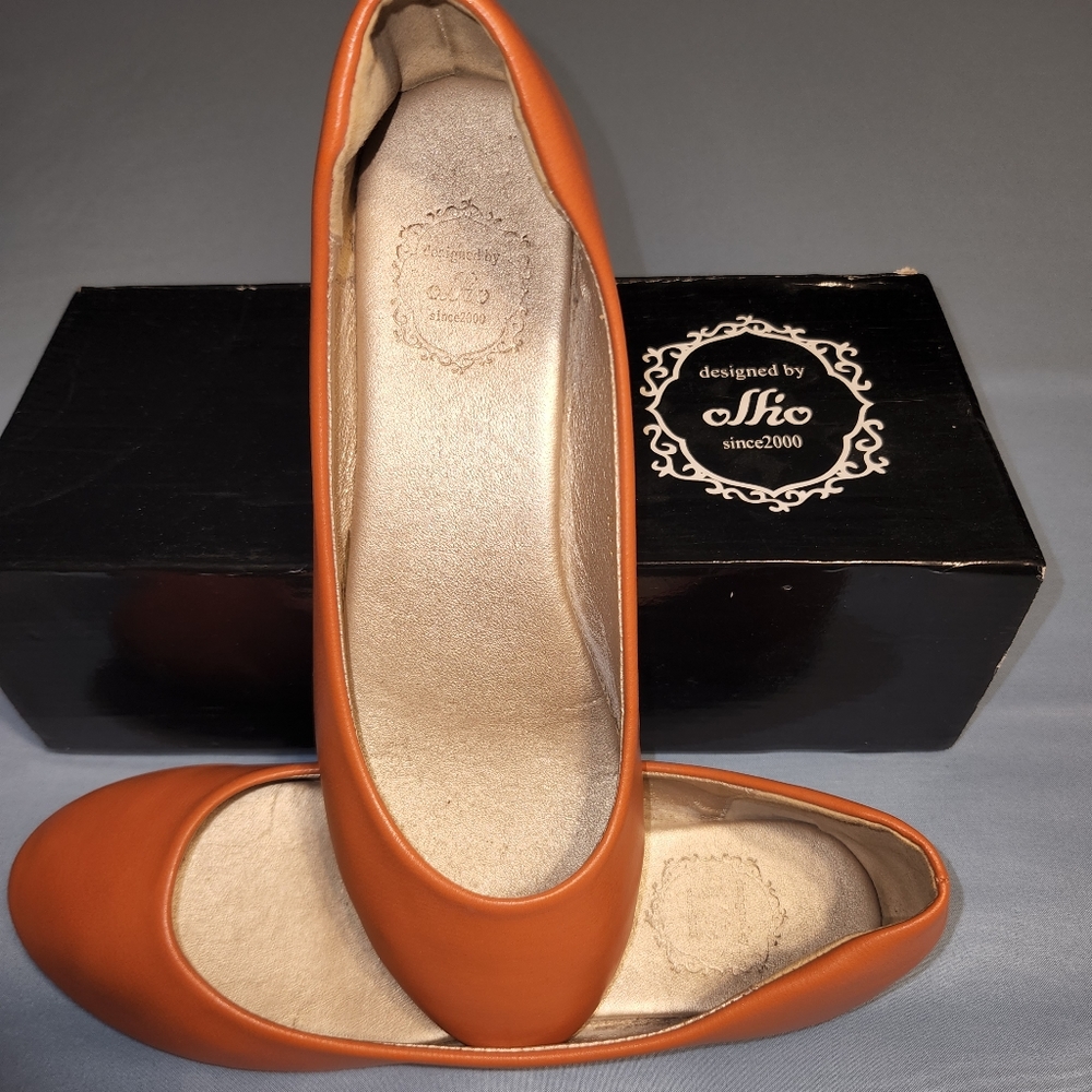 Orange flats, size 6.5